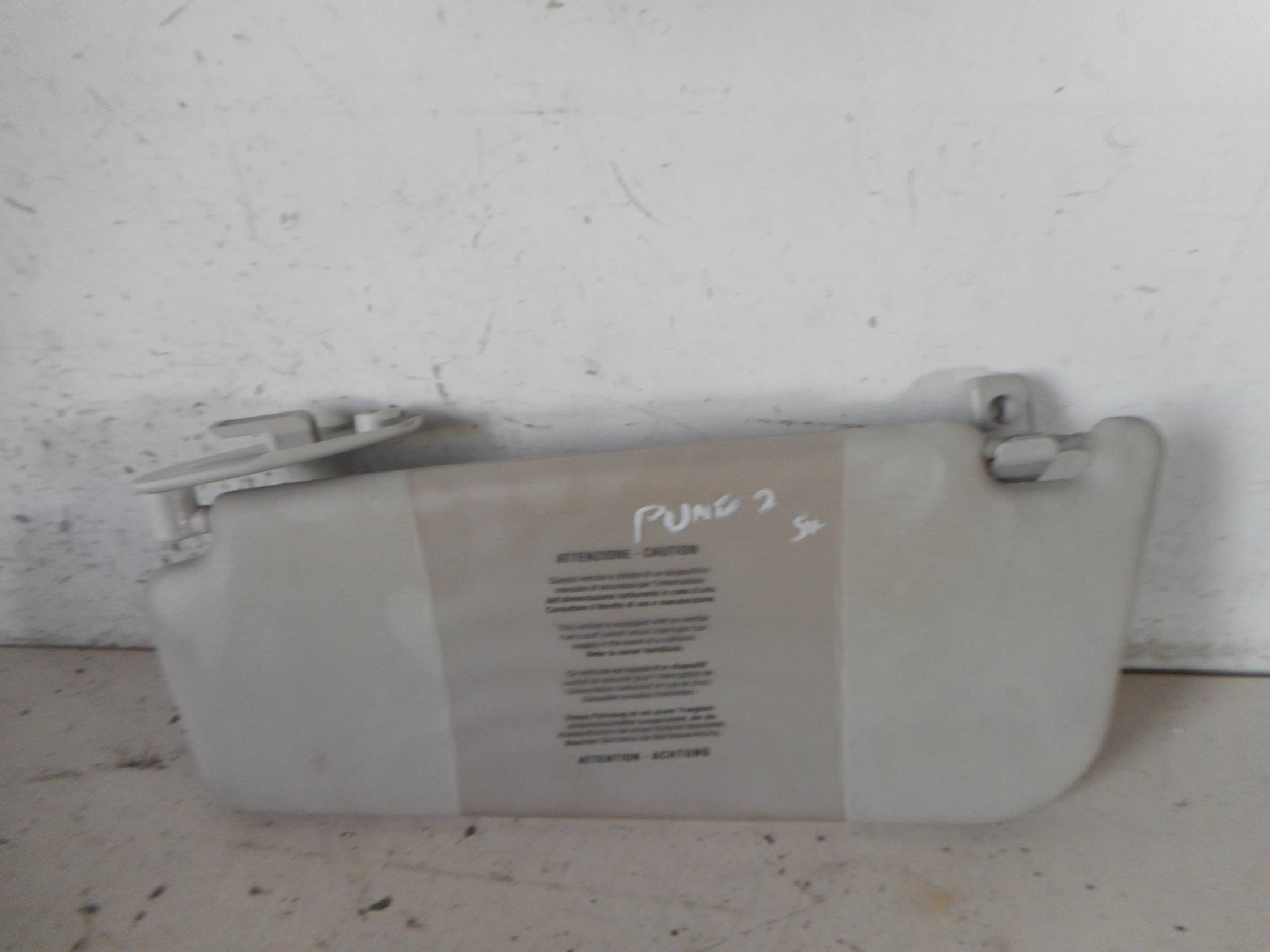 Aletta parasole parabrezza sx.